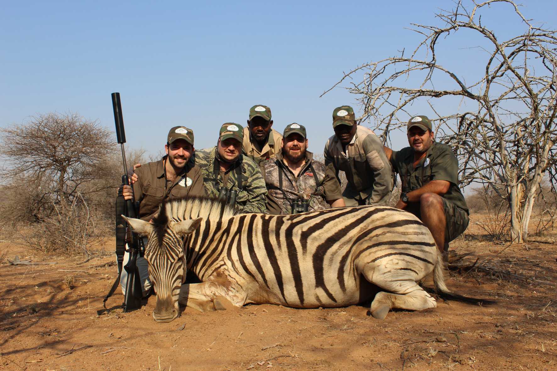 A client next to their hunting trophy