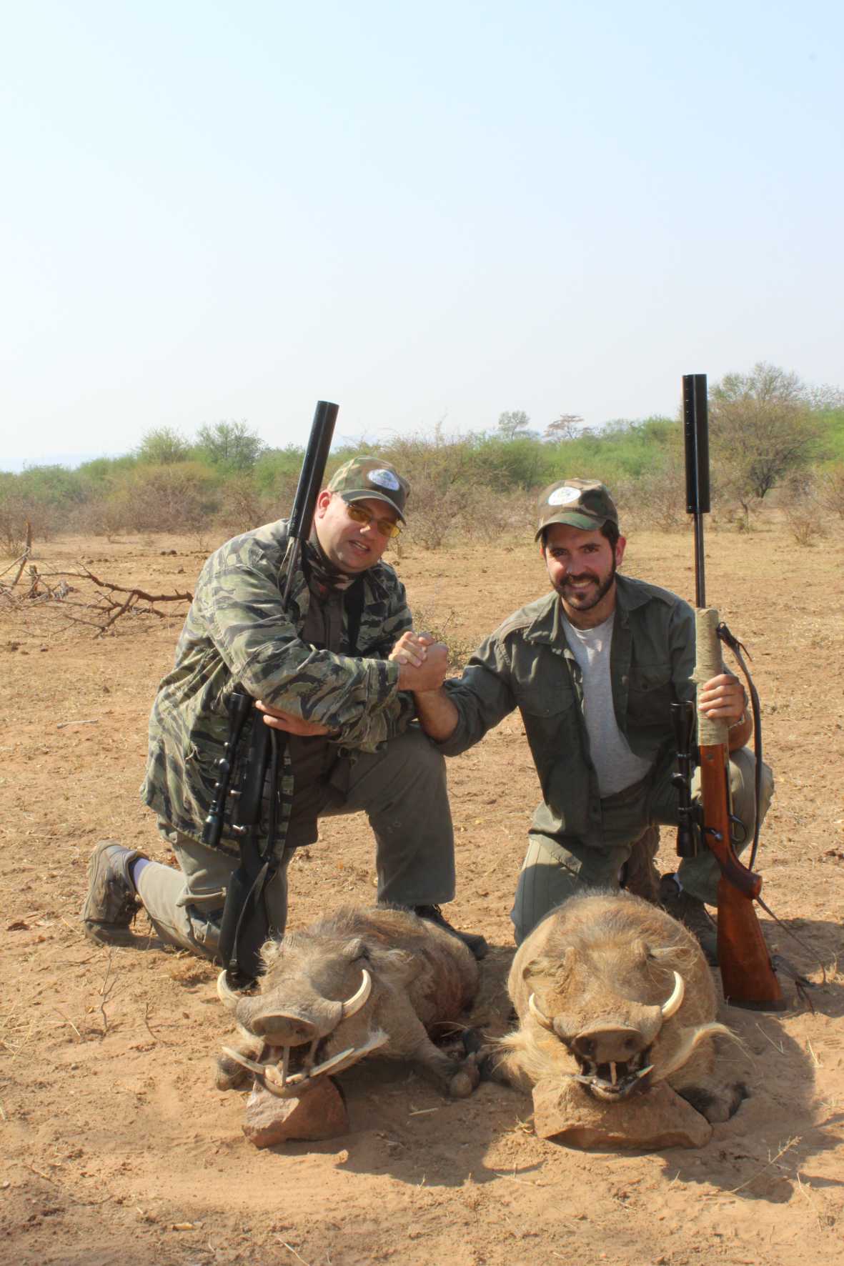 A client next to their hunting trophy