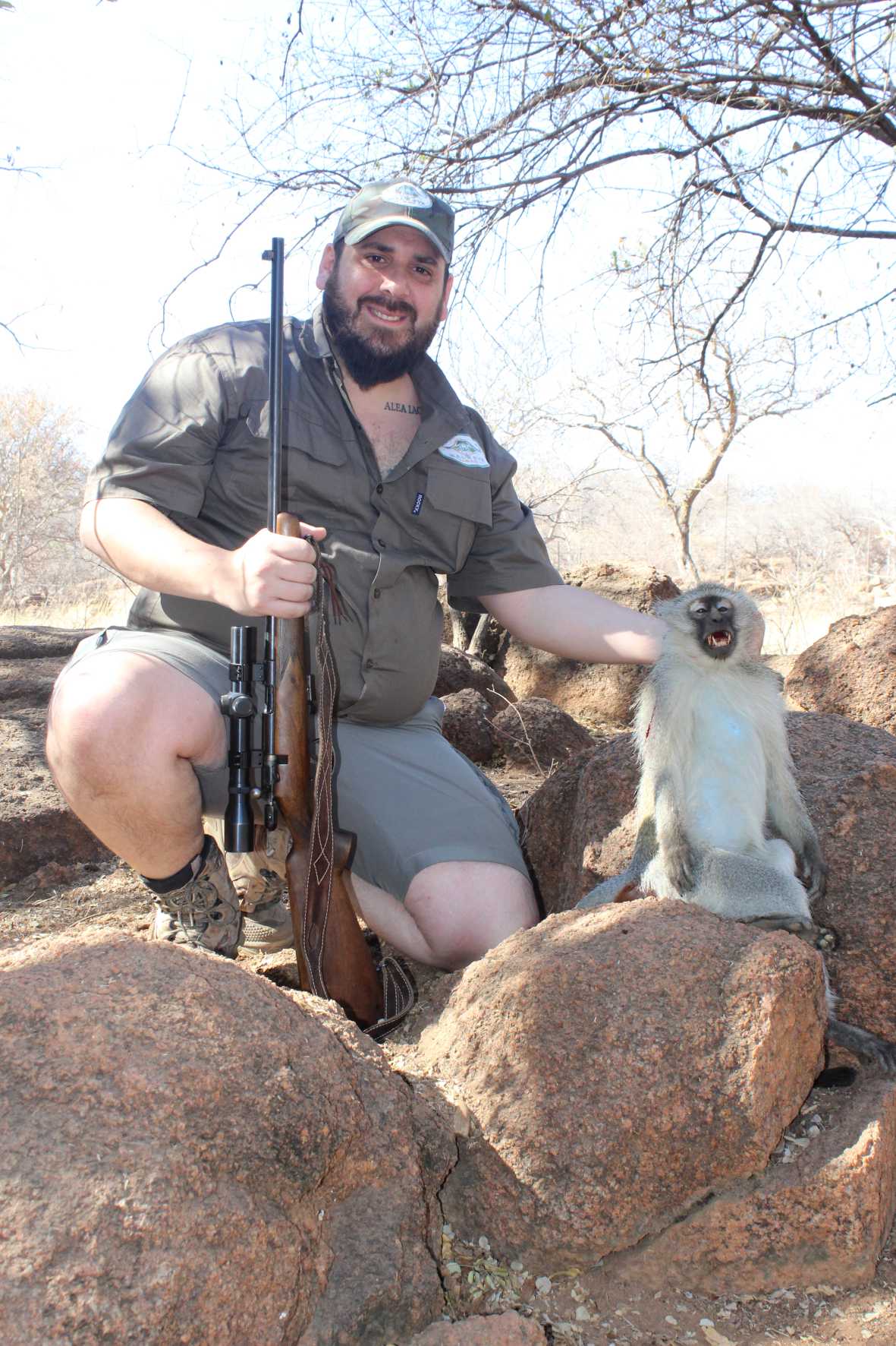 A client next to their hunting trophy