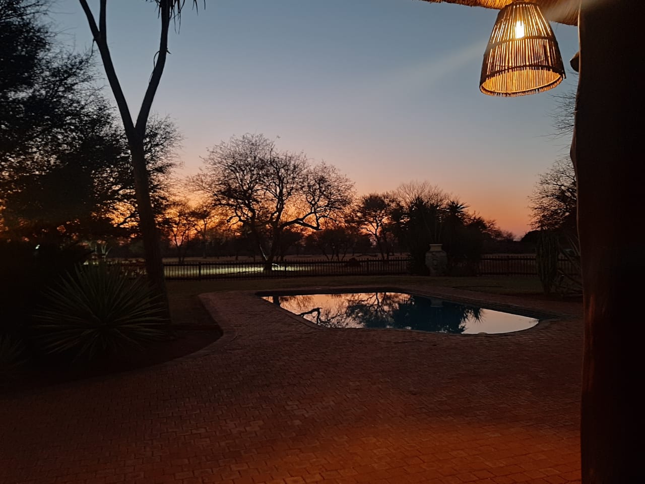 A swiming pool at a hunting lodge