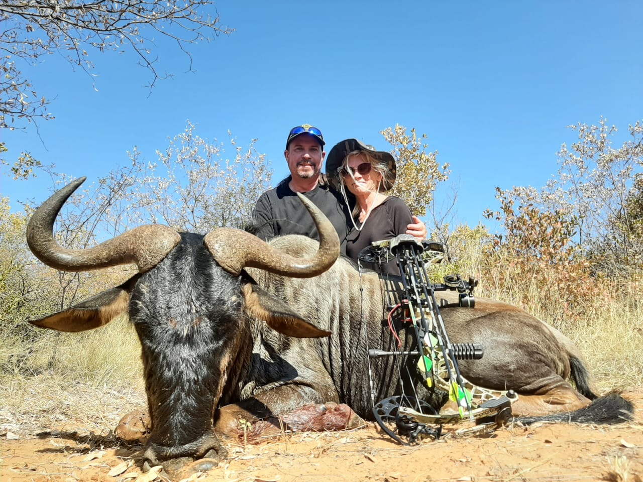 A client next to their hunting trophy