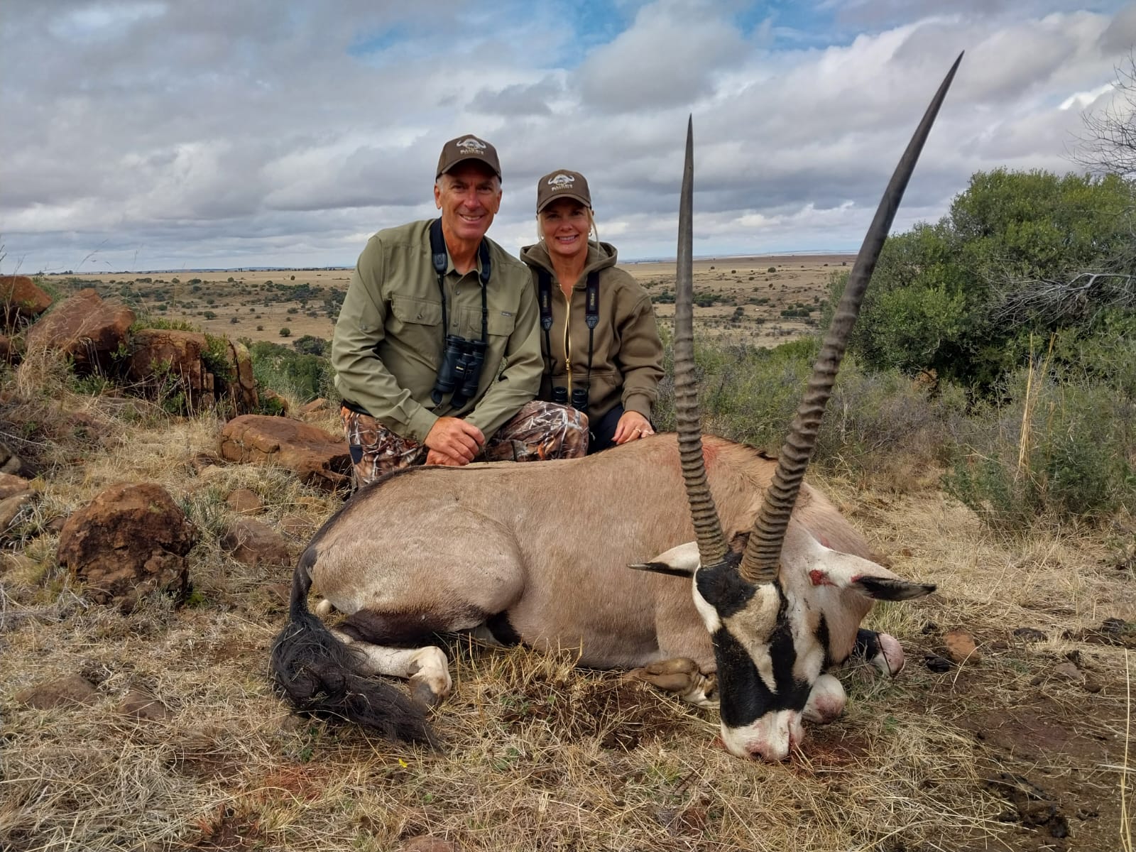 A client next to their hunting trophy