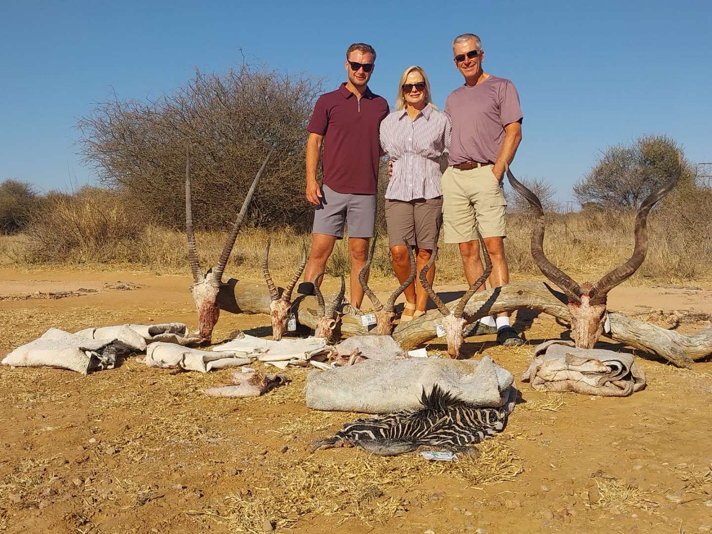 A client next to their hunting trophy